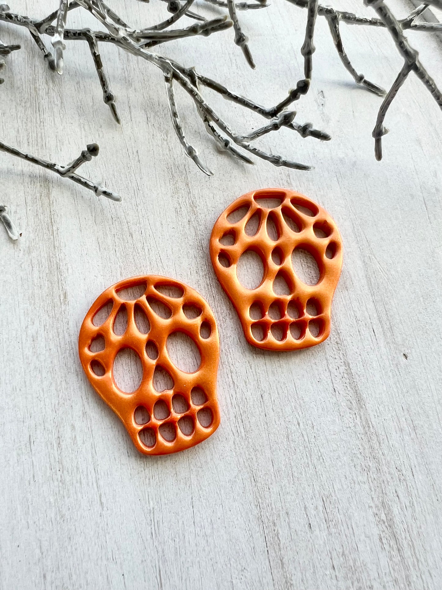 Cutout Skull Dangles (various colors)