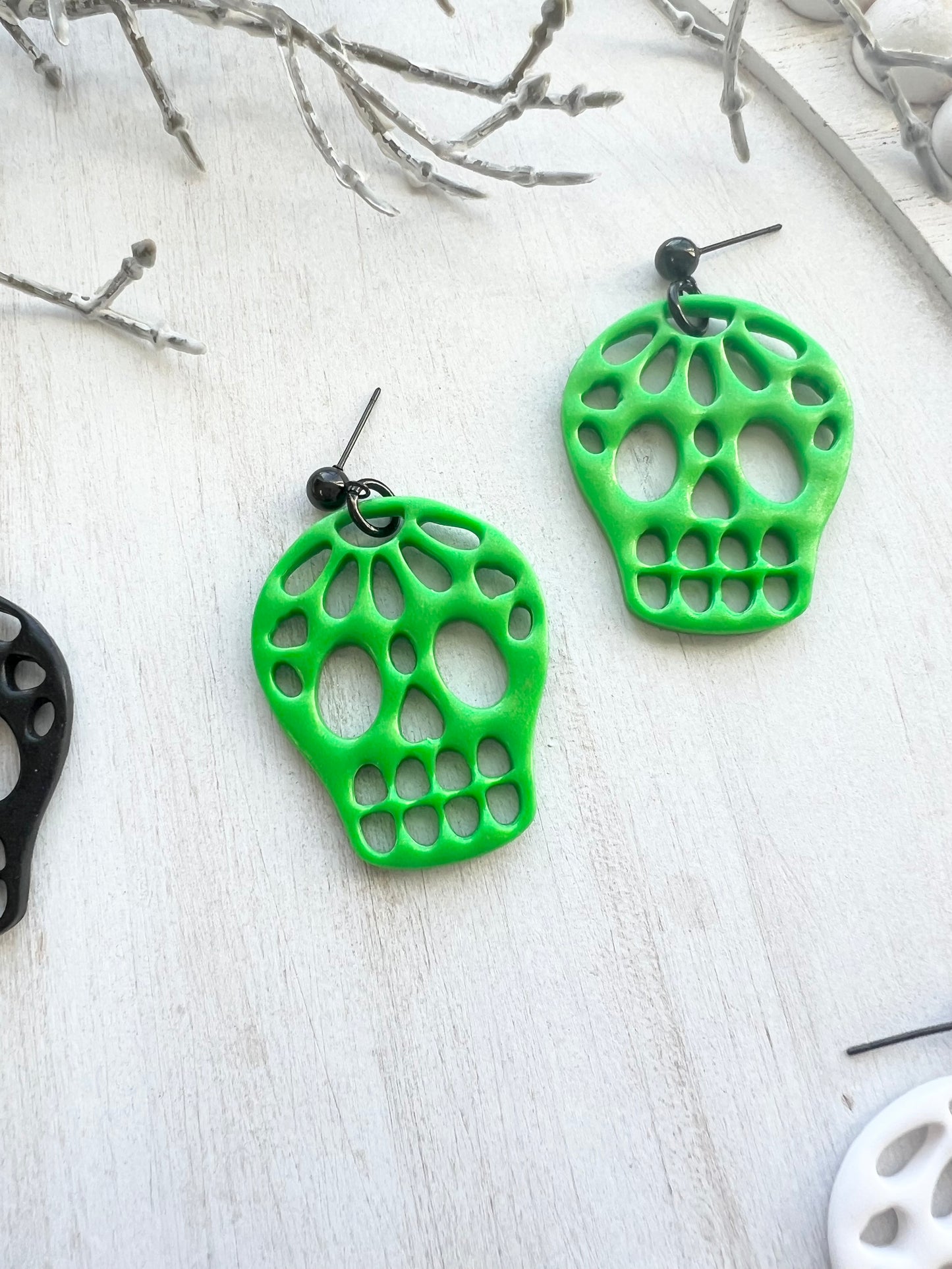 Cutout Skull Dangles (various colors)
