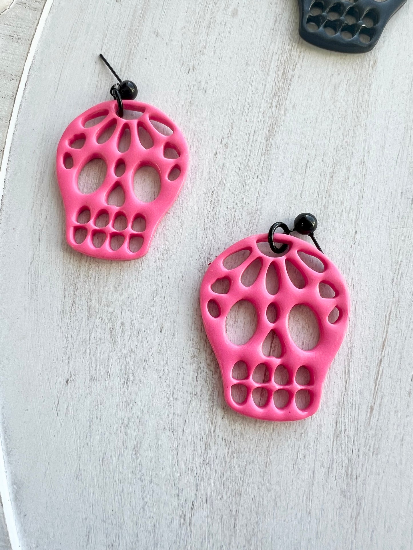 Cutout Skull Dangles (various colors)
