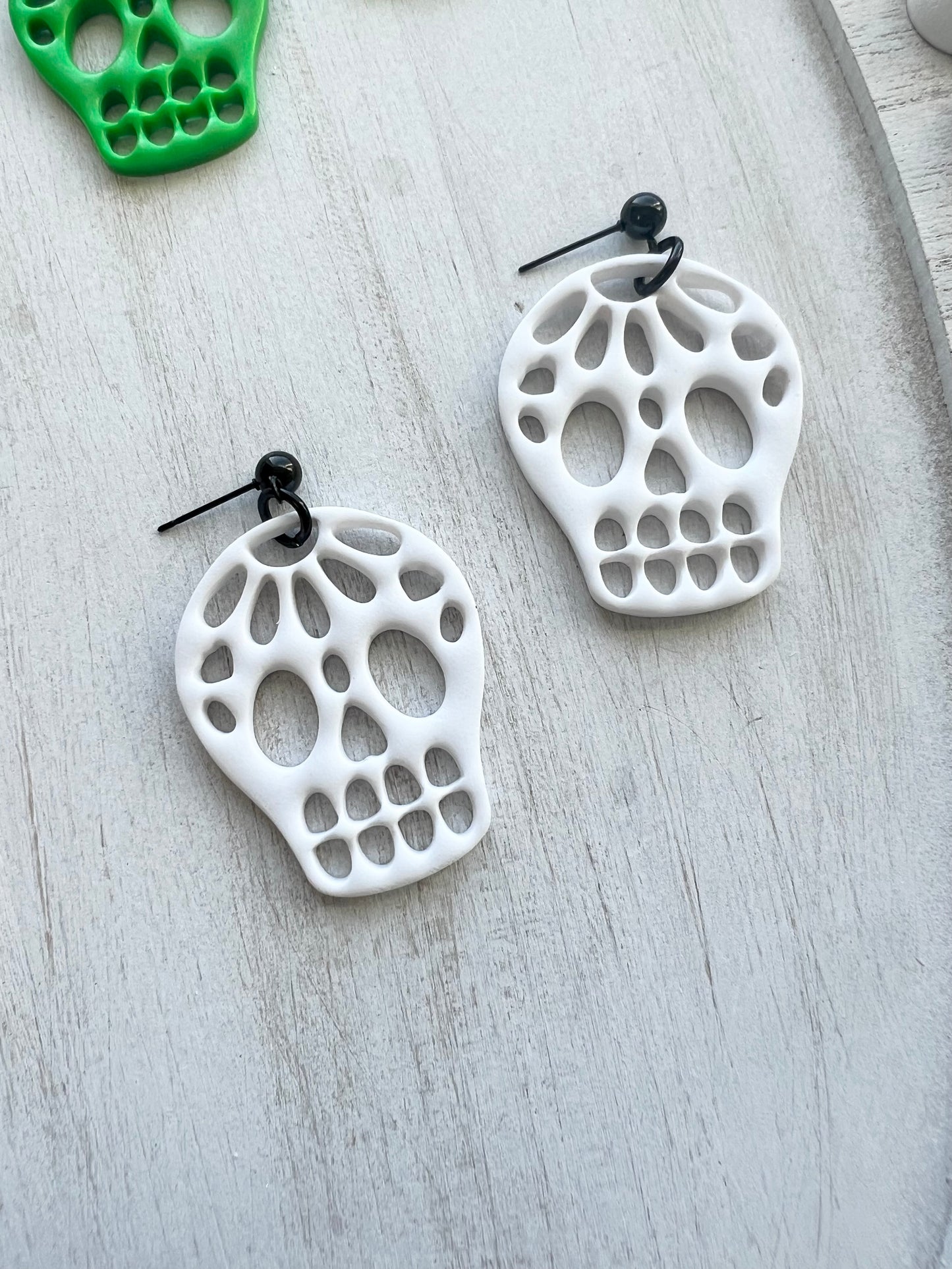 Cutout Skull Dangles (various colors)