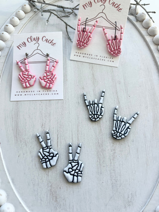 Skeleton Rock and Peace Sign Dangles (various colors)